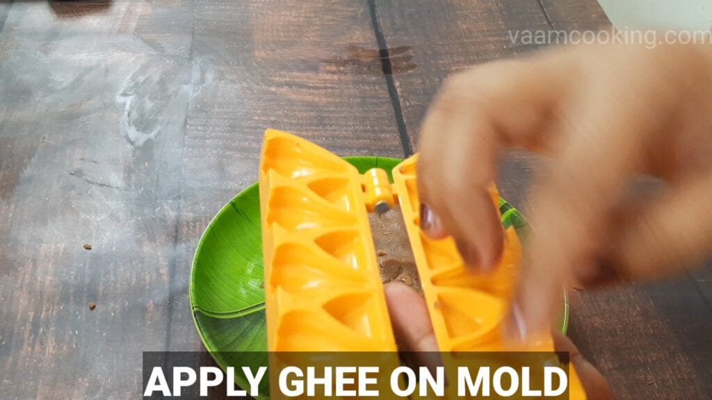 chocolate-modak-recipe apply ghee on mold