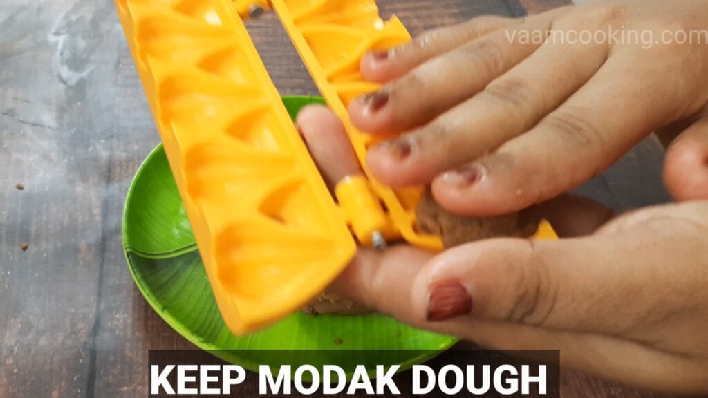 chocolate-modak-recipe feel mold with modak dough