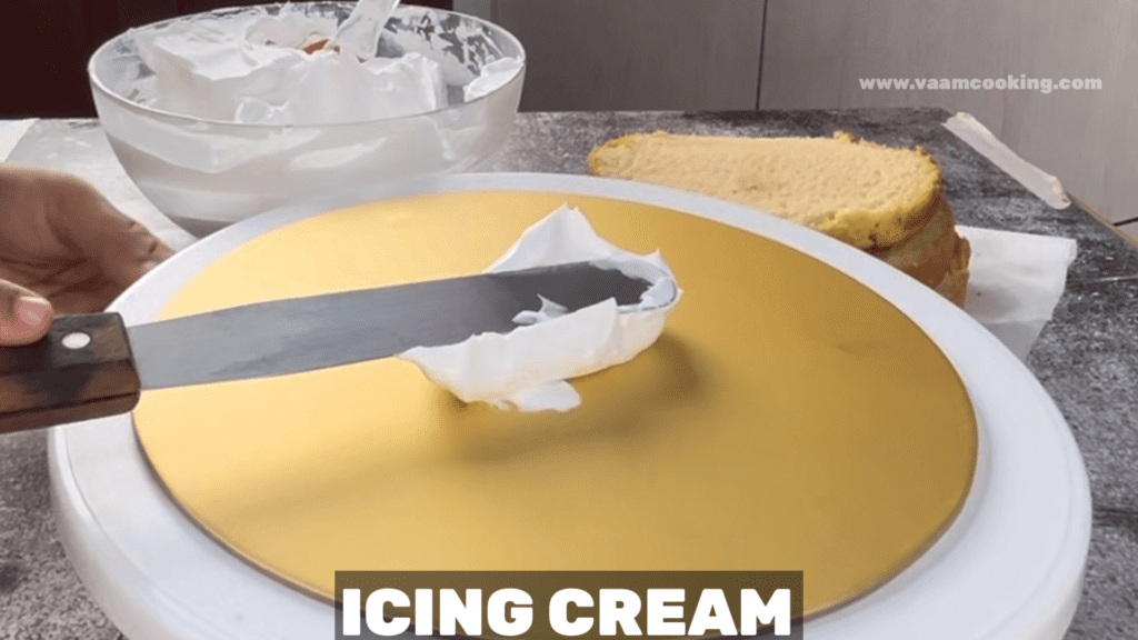 Mixed-Fruit-Cake-apply icing cream